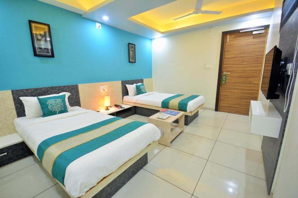 אחמדאבאד Hotel Sigma Inn מראה חיצוני תמונה